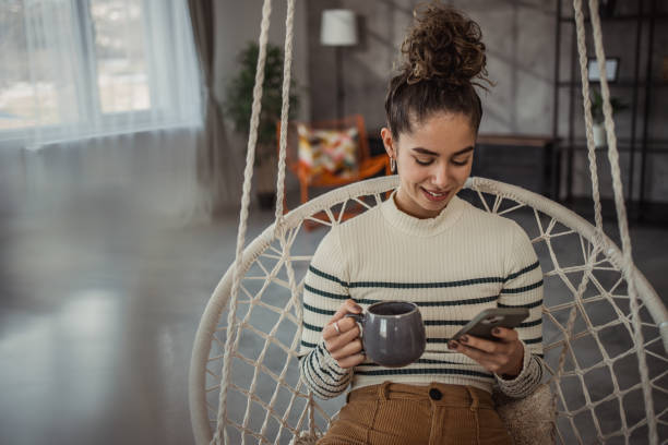 istock A young beautiful woman enjoying her morning coffee 2096097030