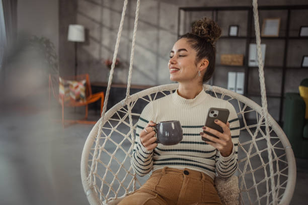 istock A young beautiful woman enjoying her morning coffee 2096101227