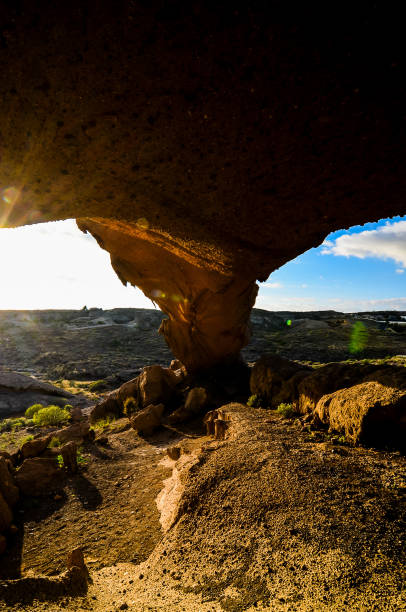 natural arch in the desert - image alternative energy canary islands color image 뉴스 사진 이미지