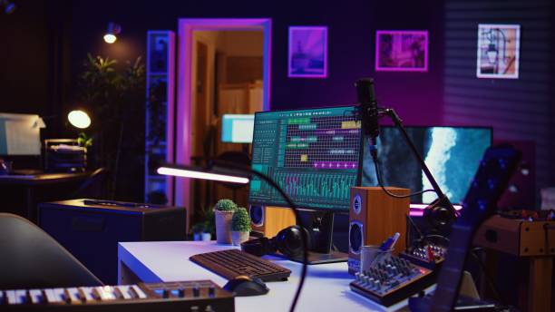 istock Electronic instruments used for mixing and recording tunes in empty home studio 2096121576