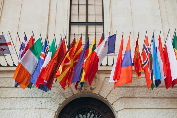 istock National flags of various countries flying in the wind. Colorful flags from different countries. Flags Organization for Security and Co-operation in Europe 2096131059