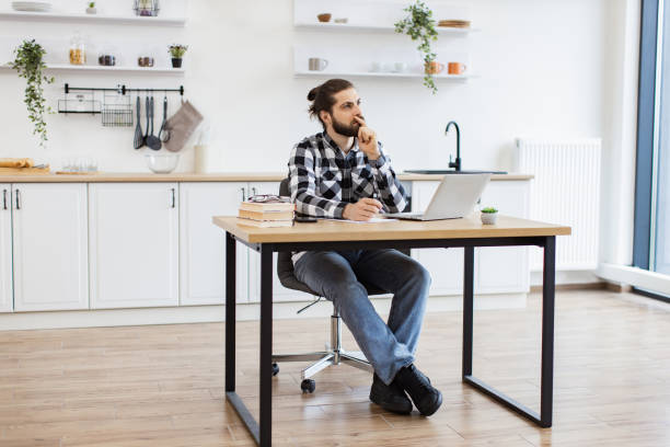 istock Self-employed worker carrying out professional activity in comfortable workplace 2096141169