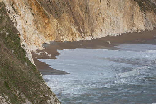 Limestone cliffs, part of the Jurassic Coast near Durdle Door in March, Dorset, England, United Kingdom