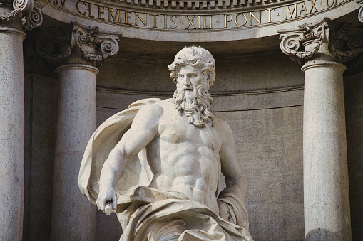 Neptune sculpture in Trevi Fountain. Rome, Italy