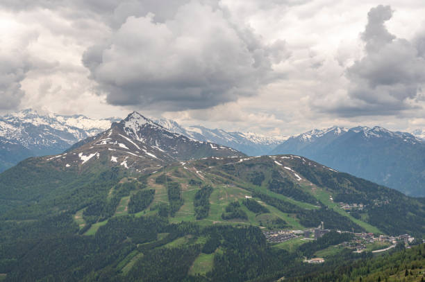 Katschberg Pass or Katschberghöhe ski resort in the Schischaukel Katschberg-Aineck ski area during an overcast springtime day in the Carinthian Alps in Austria.
