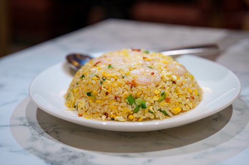 Shrimp fried rice with egg, traditional Chinese food.