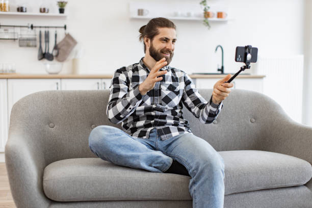 istock Caucasian person conducting online conference via modern device. 2096210510
