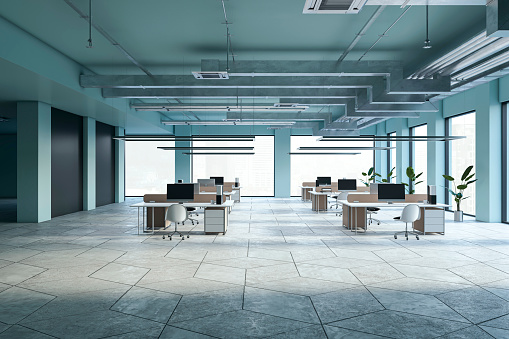 Modern spacious coworking office interior with furniture, windows and city view. 3D Rendering