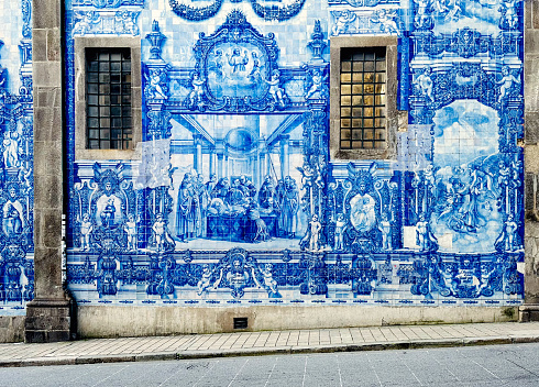 Porto, Portugal - Chapel of Souls (Capela das Almas) facade with famous portuguese blue ceramic tiles on the facade traveling in Porto city, Portugal
