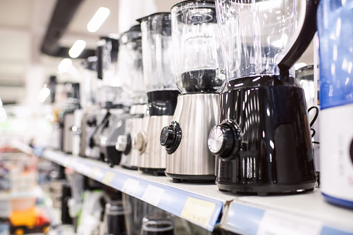 Electric mixers on a shelf in a store or showroom