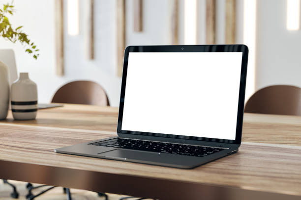 istock Laptop on a modern conference room table, isolated screen for creative mockups. 3D Rendering 2096320275