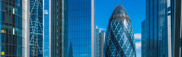 Skyscrapers blue sky crowded downtown financial district cityscape panorama London stock photo