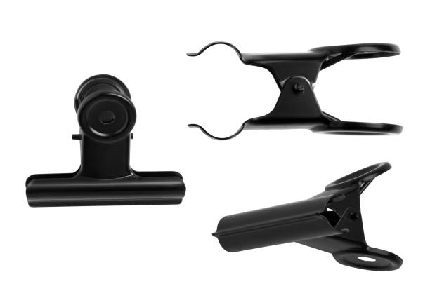set.Black paper clips on a blank background