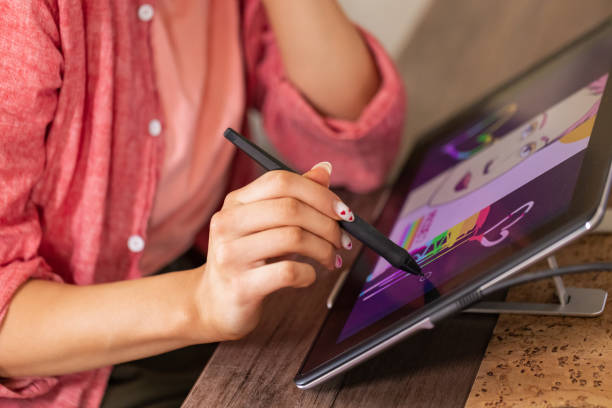 istock Young Woman Sketching on Tablet 2096394947