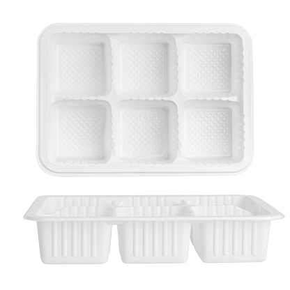 Disposable plastic container with cells on empty background