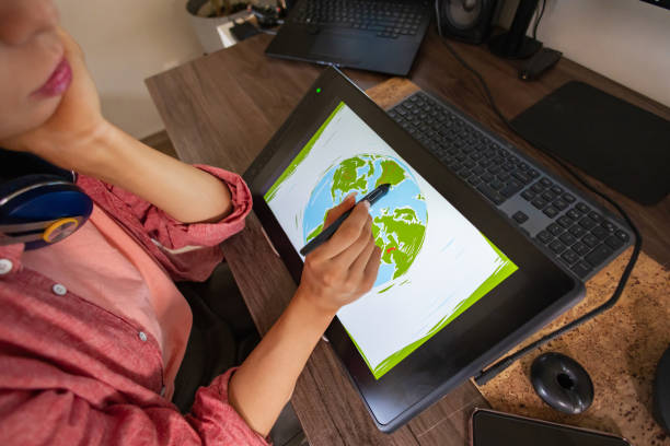 istock Young Designer Launching Business with Earth Day Art 2096403367