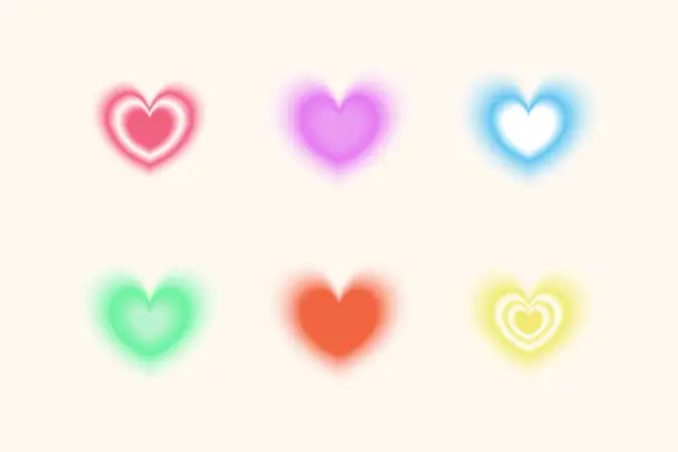 Vector illustration of Y2K style blurred trendy hearts set. Retro 2000s design elements with an aura effect.