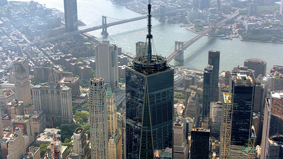 Aerial view of One World Trade Center surrounded by modern skyscraper in New York City, New York State, USA.