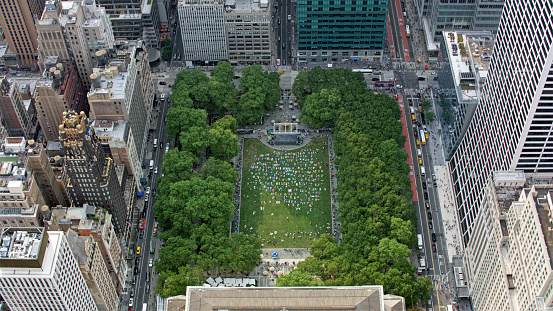 Aerial view of Bryant Park surrounded by buildings in New York City, New York State, USA.