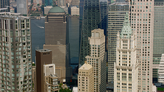 Aerial view of Woolworth Building surrounded by modern skyscraper in New York City, New York State, USA.