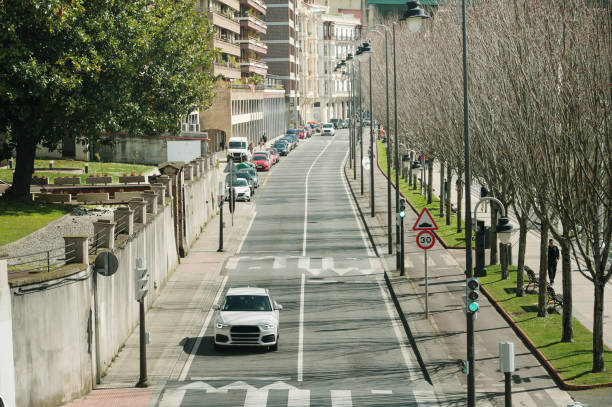 istock Street with car from above 2096413614