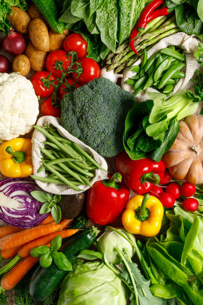 istock Vegetables background. Various vegetables on kitchen table. Clean eating, healthy food concept, flat lay, top down view 2096444699