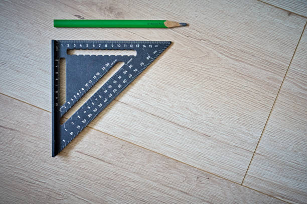 Science and education - Yellow set square triangle isolated on a white background.