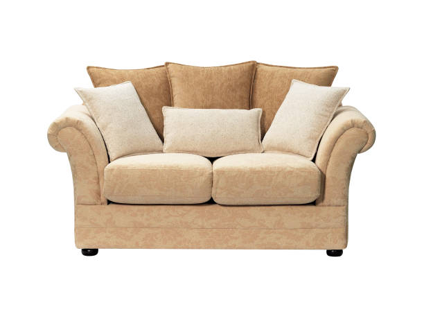 Digitally generated three-seat sofa with pillows (retro prints) isolated on white background.