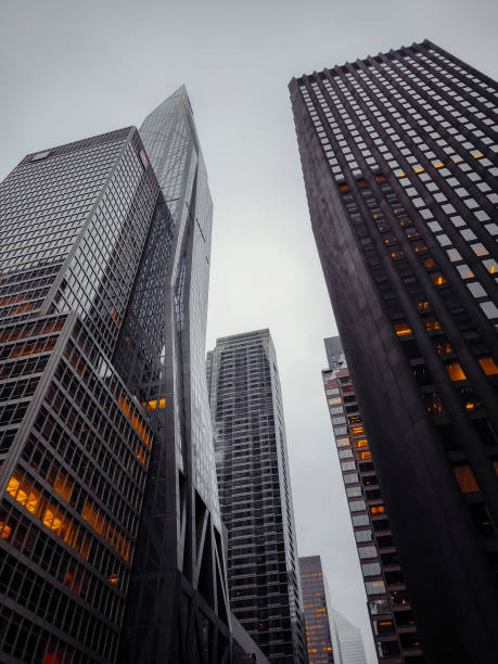 istock skyscrapers in the financial district with low lightening clouds 2096473593