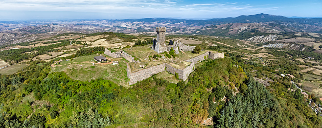 Exterior view of the Alcazar of Segovia, Spain. Tourists visiting the castle.