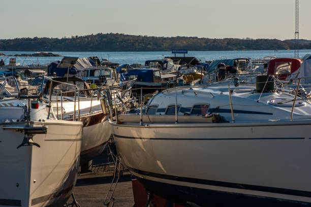 Gothenburg, Sweden - April 22 2020: Boats laid up near a harbour.