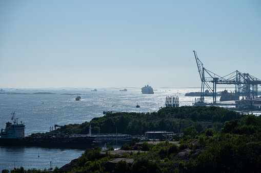 Gothenburg, Sweden - June 07 2023: Large ships leaving and entering port.