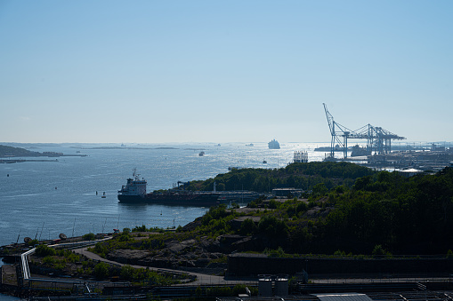 Gothenburg, Sweden - June 07 2023: Large ships leaving and entering port.