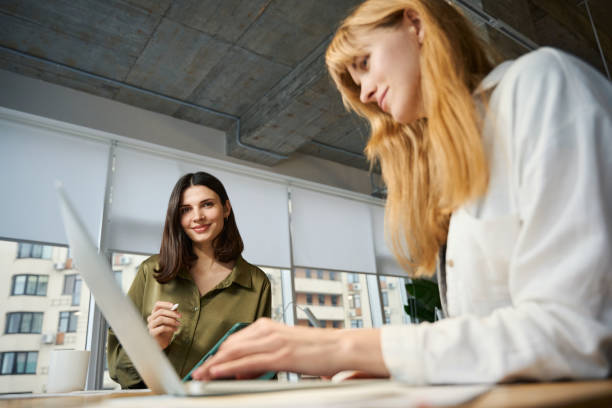 istock Creative collaboration of clothing designers creating ideas in coworking space 2096515163