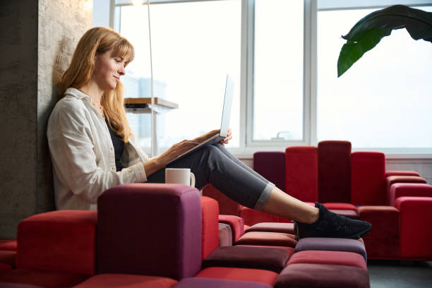 istock Fashion designer working with sketches on laptop 2096516194