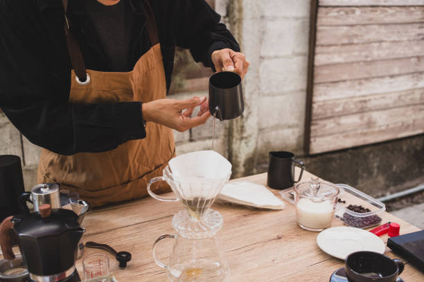 istock Man making coffee for dripping hot coffee into the cup with equipment, tool brewing at kitchen home 2096517859
