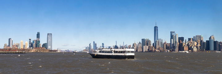 Brooklyn skyline behind Liberty ferry in Hudson River.