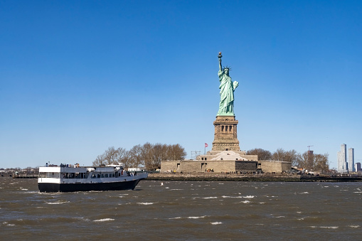 new york cityscape skyline empire state building and statue of liberty