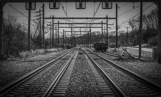 A wide angle drone view of a disused turntable in a railyard.