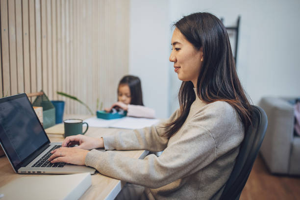 istock Woman working in home office 2096604224