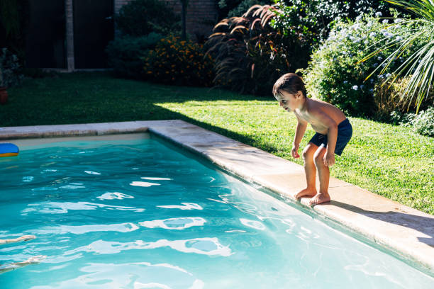 istock Little boy in swimming a pool. 2096619046
