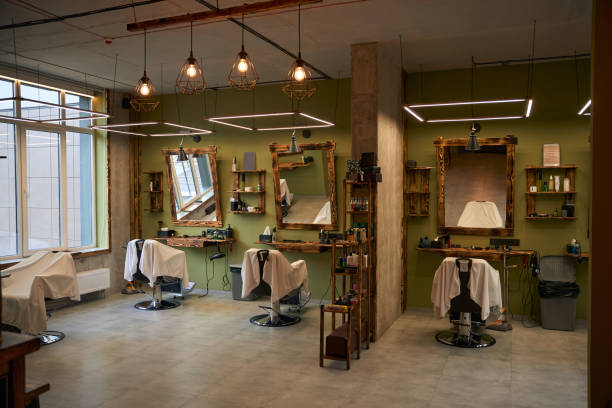 istock Empty barber's workplaces in stylish hairdressing salon 2096632533