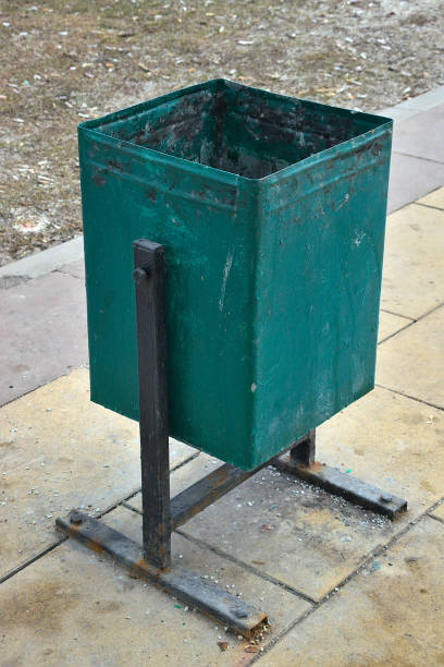 istock green metal trash garbage can 2096644333