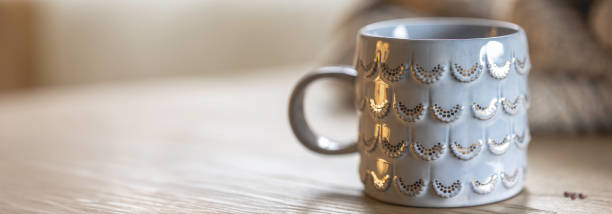 istock Close-up, shiny gray cup on a blurred background, copy space. 2096657777