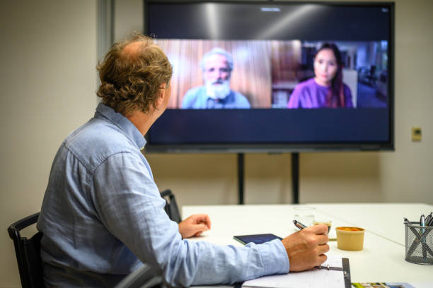 istock Businessman on conference call 2096682626