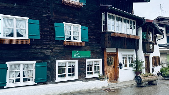 Oberstdorf, Germany - March, 12th - 2024: traditional wooden house.