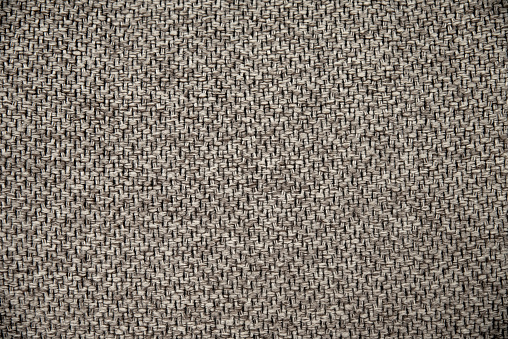 Brown woven matting fabric close up