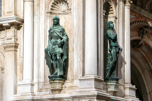 Close up of the statues of Mars and Adam designed by Antonio Rizzo decorating the Foscari Archway of Doges Palace of Venice