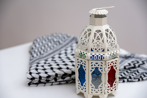 palestine keffiyeh with ramadan lantern on isolated background