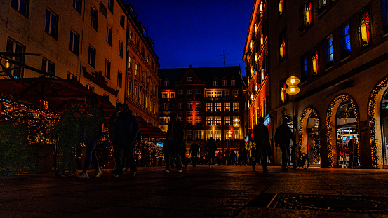 Crowded street in Christmas at night in Munich old town, Germany